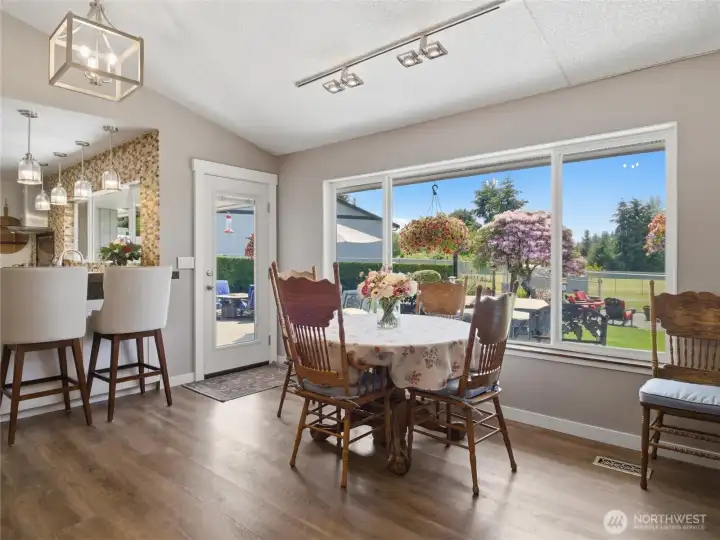 another area to dine with a full view of the backyard and mountain.