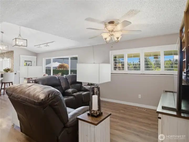 The family room area of the great room keeps the entire area connected.