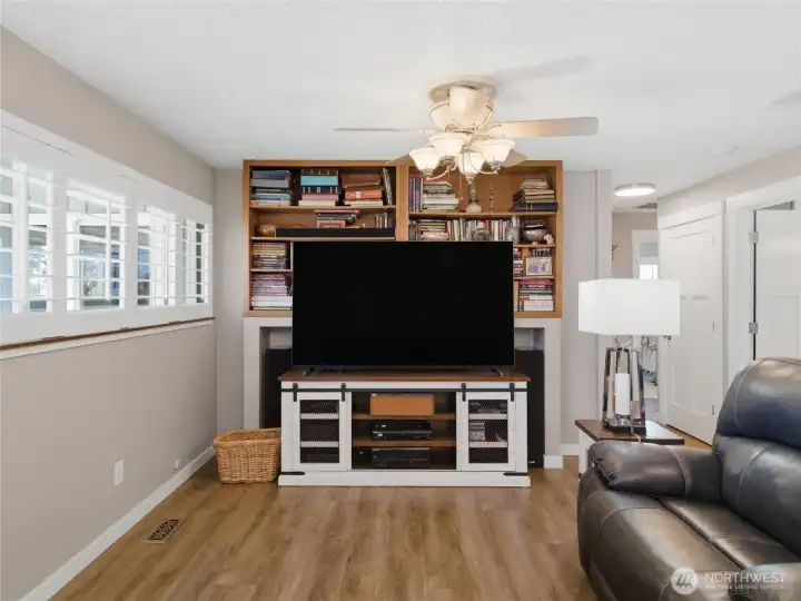 Plenty of space for media, and old fashion reading joy! All the rooms have plantation shutters