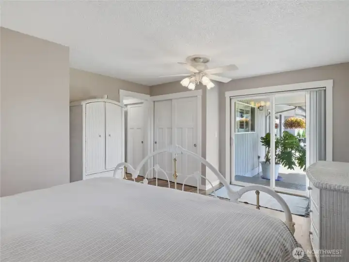 The primary has a lot of closet space and exits to the beautiful patio area