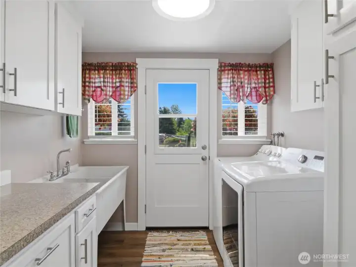 Laundry room with another exit to the patio area.