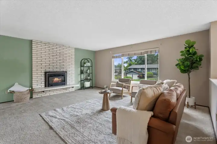 Cozy gas fireplace creates a warm gathering space