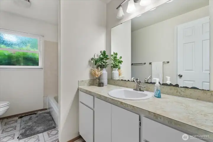 Conveniently located guest bathroom