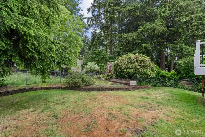 Fully fenced backyard offers privacy and space to play