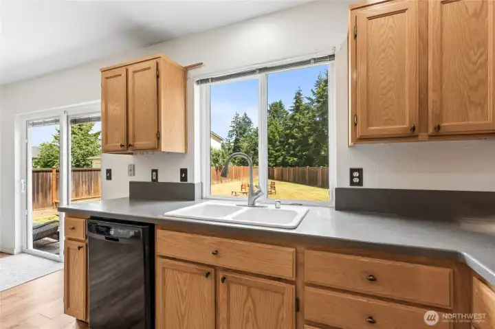 Kitchen sink perfectly positioned to enjoy views of the backyard while tackling everyday tasks. Kitchen sink perfectly positioned to enjoy views of the backyard while tackling everyday tasks.