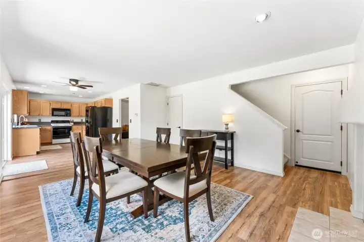 Open dining area with flexible use as a formal dining room or sitting area, complete with a gas fireplace and easy access to the garage. Open dining area with flexible use as a formal dining room or sitting area, complete with a gas fireplace and easy access to the garage.