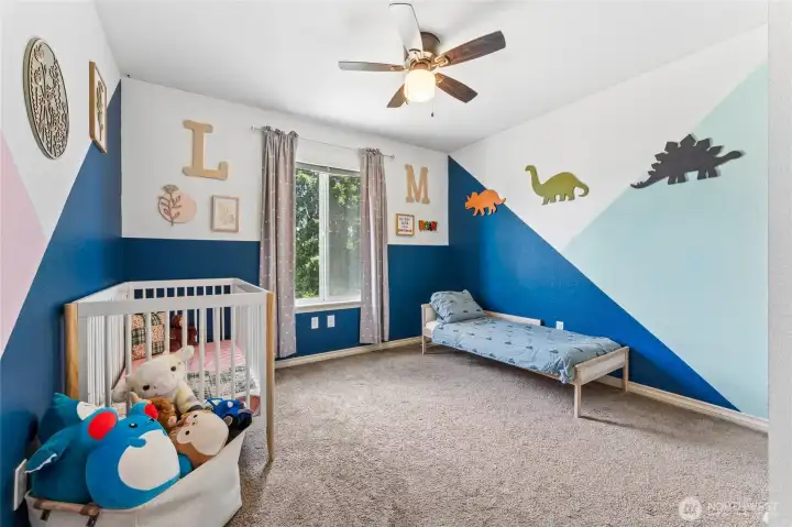 Bedroom 2 - with ceiling fan overlooking backyard. Bedroom 2 - with ceiling fan overlooking backyard.