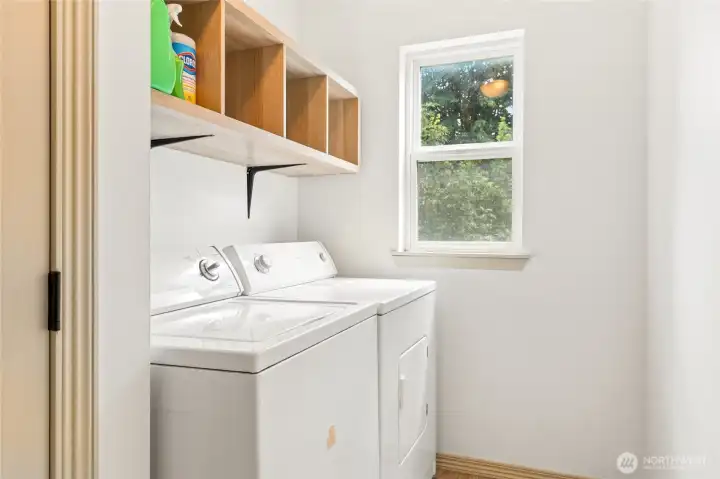 Full Laundry room with additional storage closet. Full Laundry room with additional storage closet.