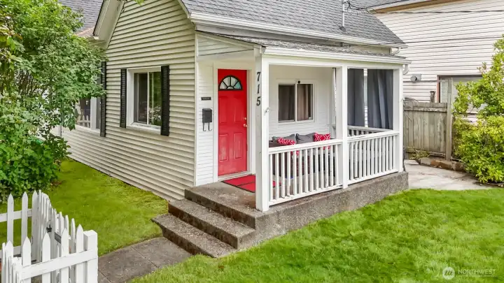 Cover front porch with plenty of seating. Exterior is a combination of wood and vinyl. Cover front porch with plenty of seating. Exterior is a combination of wood and vinyl.