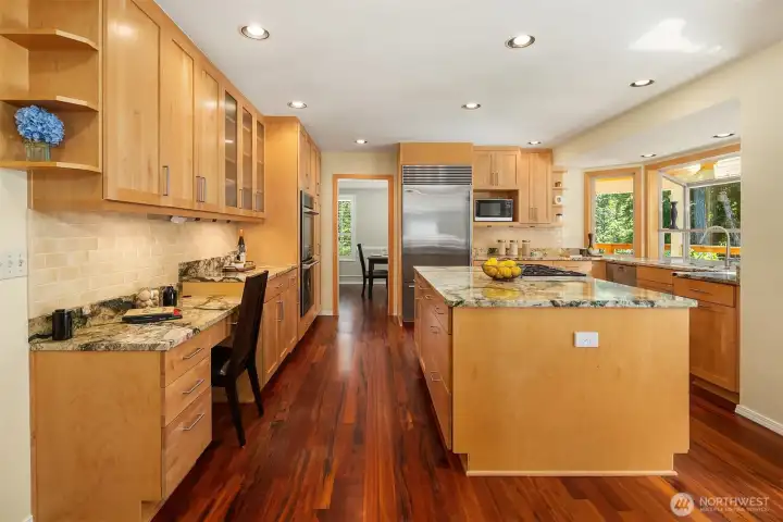 Open-concept kitchen offers extensive counter space and seamless flow for everyday living Open-concept kitchen offers extensive counter space and seamless flow for everyday living