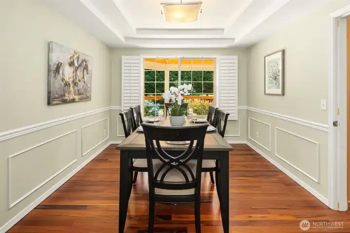 Dining area offers elegant millwork, hardwood floors, and ample space for entertaining Dining area offers elegant millwork, hardwood floors, and ample space for entertaining