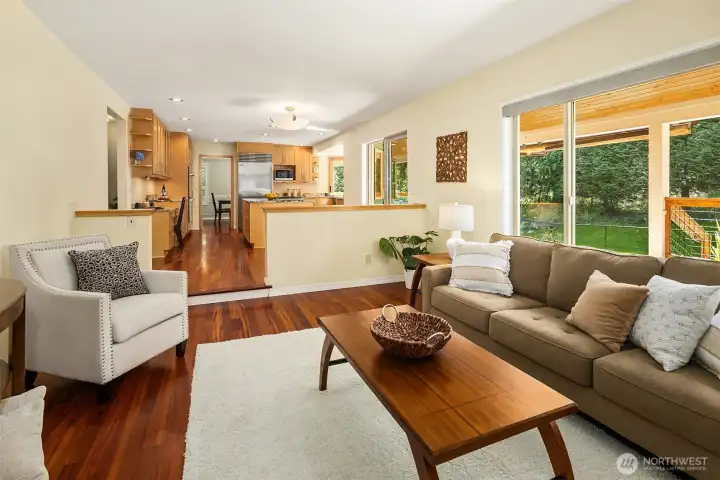 Spacious living area offers large windows that bring the outdoors in and provide abundant natural light Spacious living area offers large windows that bring the outdoors in and provide abundant natural light