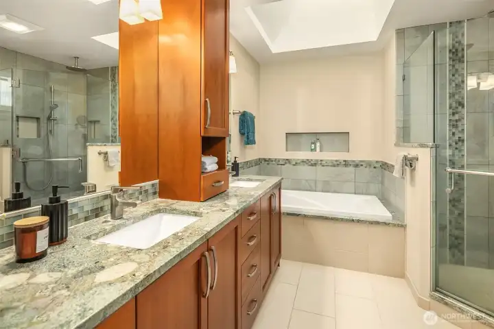 Primary bathroom includes dual vanities, ample storage, and a spacious layout Primary bathroom includes dual vanities, ample storage, and a spacious layout