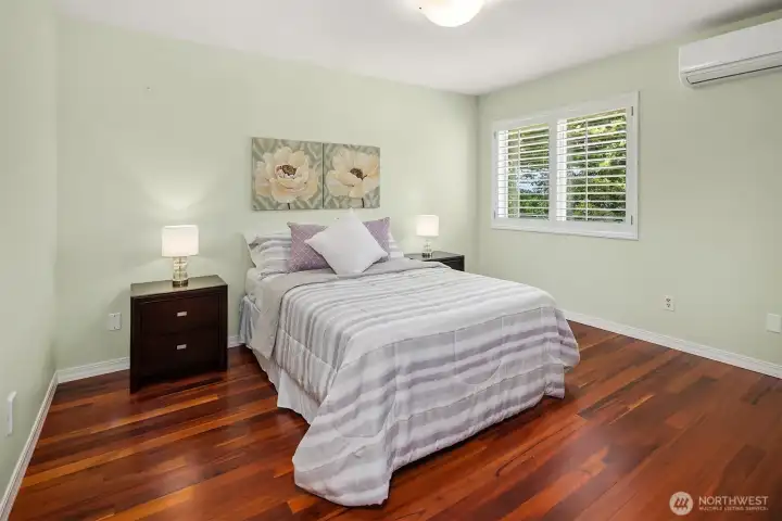 Additional bedroom offers hardwood floors and plenty of natural light. Additional bedroom offers hardwood floors and plenty of natural light.