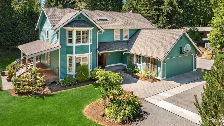 Front exterior with established landscaping and inviting approach to the home. Front exterior with established landscaping and inviting approach to the home.