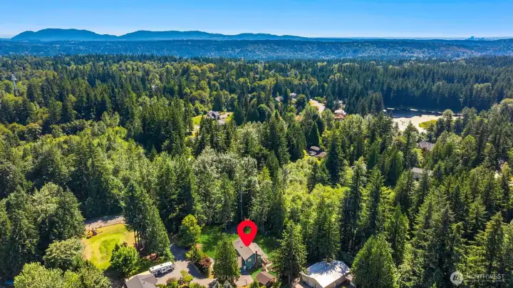 Sweeping views of forests and distant mountains create a picturesque setting Sweeping views of forests and distant mountains create a picturesque setting