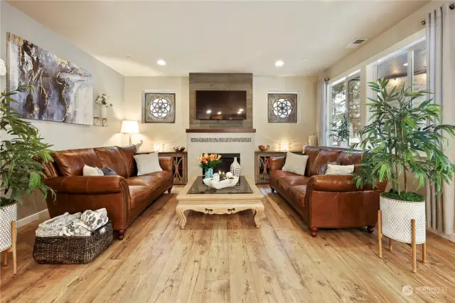 Large livingroom with gas fireplace and big screen TV is included.