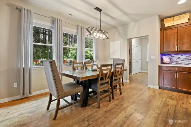 Large dinning room with views of back yard