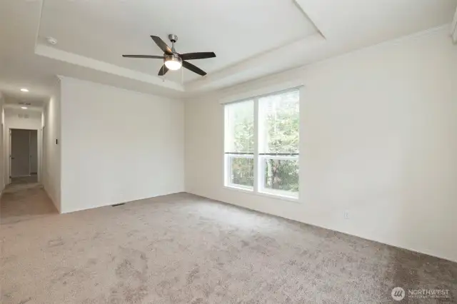 9-10’ ceilings with built-in coffers, ceiling crown molding and full base trim