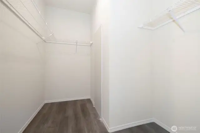 BIG walk-in closet in primary bedroom