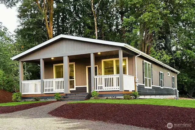 Exterior composite lap siding mix, shutters, show during the golden hour sunset.