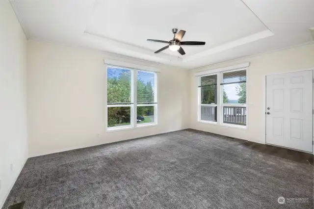 9-10’ ceilings with built-in coffers, ceiling crown molding and full base trim