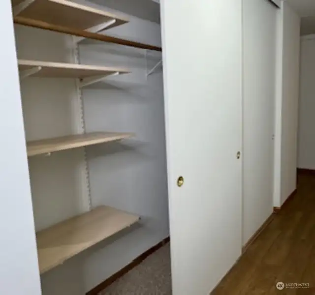 Shelving inserts in Hallway closet