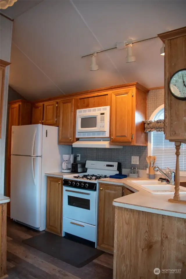 Full sized appliances in this efficiently sized home.