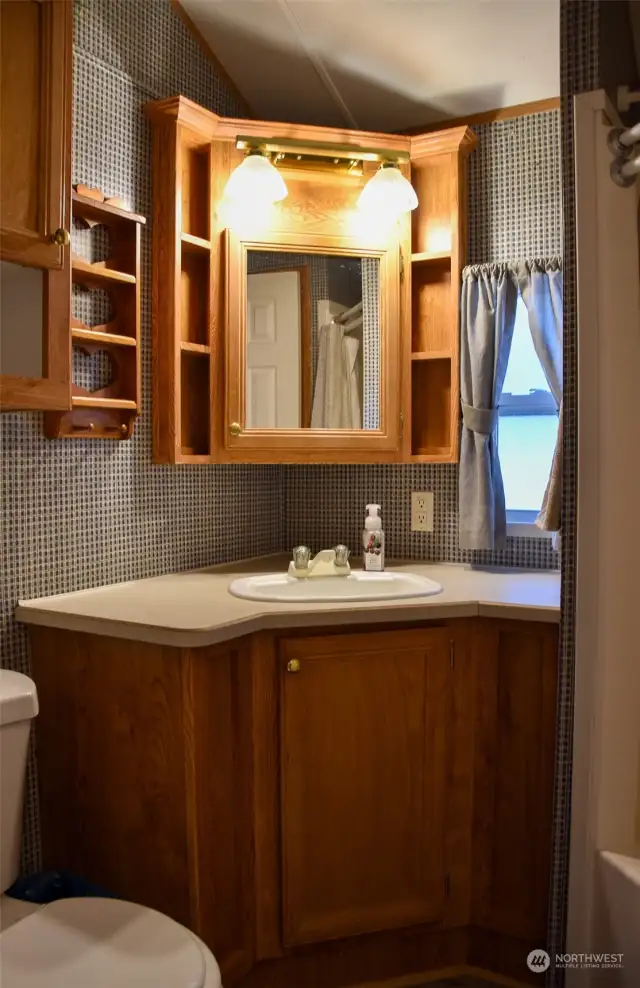 3/4 bath provides an over sized shower, and even more storage!