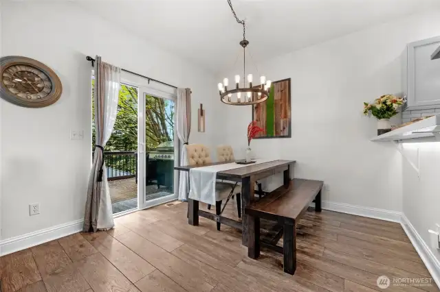 Dining space with private backyard view