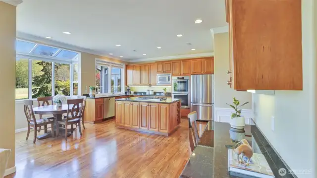 Large kitchen flows seemlessly to the family room
