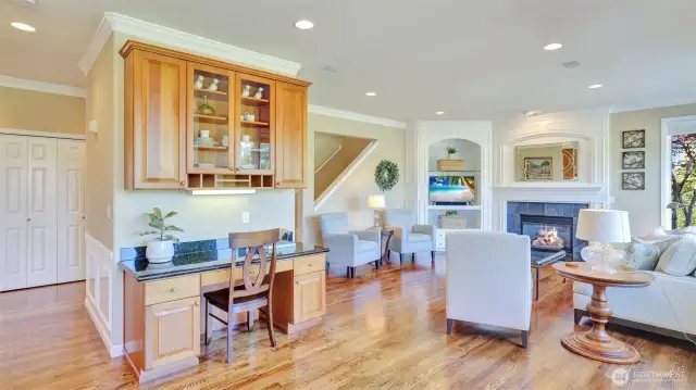 Built-in desk and storage cabinets is perfectly placed to keep you engaged with all the action