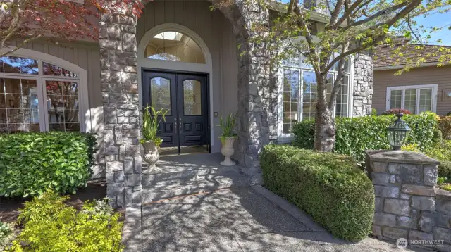 Leaded glass doors set the tone.