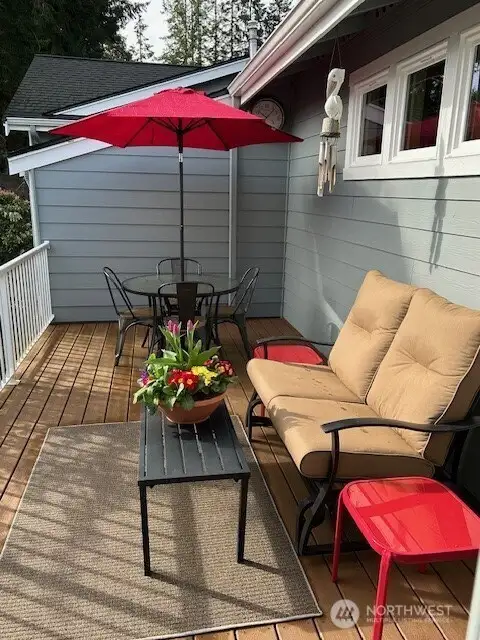 Charming porch just a step away from the living area on the main level