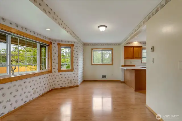 So many windows lets in natural light to enjoy the fruit trees and flowers.