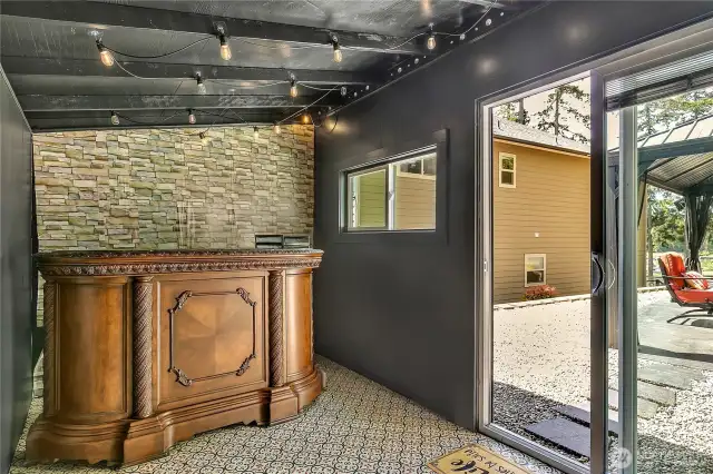 Outdoor entertainment shed