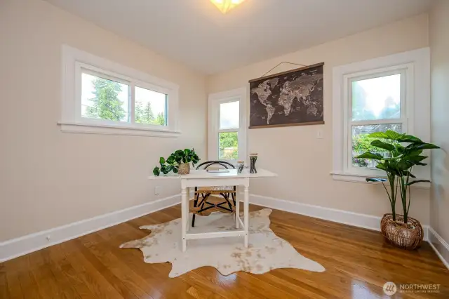 Bedroom #2 is staged as an office but also features a sizable walk-in closet with built-ins. This room also features wonderful views of the pretty backyard.