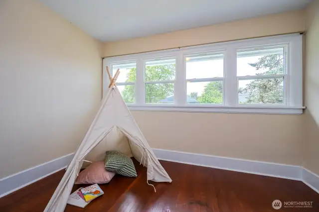 Half way down the main floor hallway you'll find a door to the stairway up. At the very top of the stairs is this adorable room with perfect views of two lovely homes across Carlyon Avenue. Playroom? Art or Yoga Studio? Sewing Room? You choose!