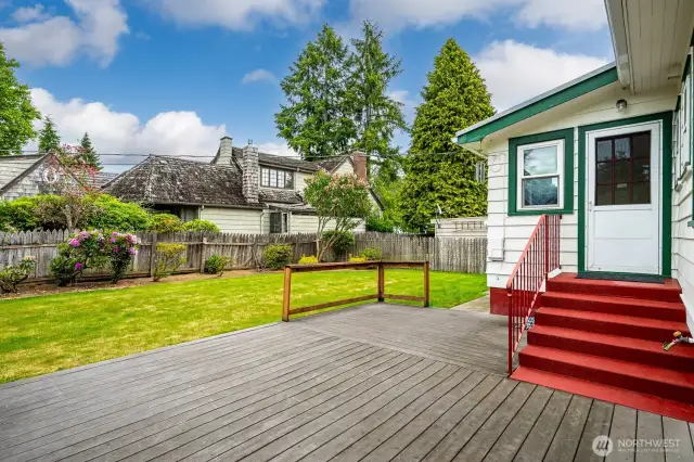 The expansive deck provides plenty of space to relax in the sunshine, entertain or enjoy a summertime meal!
