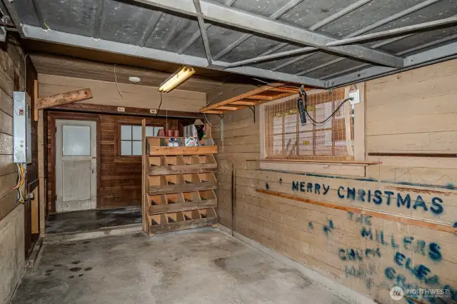 The one (small) car Garage offers 240 SF of space to park or store bikes, yard equipment, tools etc. A 6'x8' storage area with door to backyard is ahead in this photo.