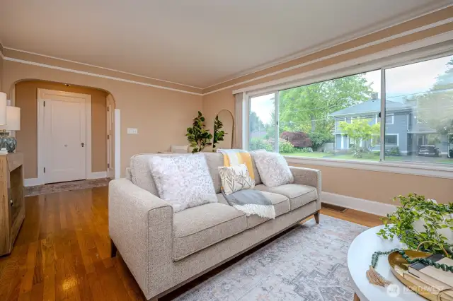 This is the perfect setting for making cherished memories with loved ones! To the left is a door to one of two main floor bedrooms.