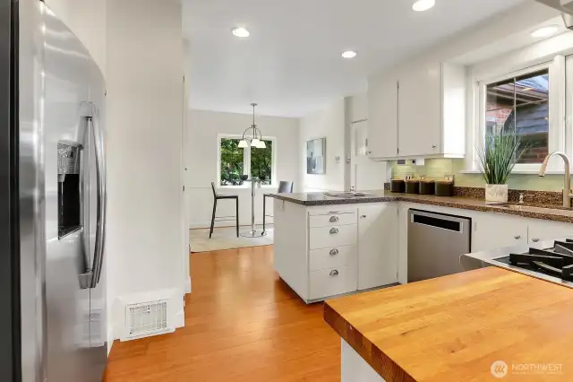 Remodeled Kitchen Shows Granite Counters, A Full Set of Stainless Steel Appliances & Spacious Breakfast Nook!