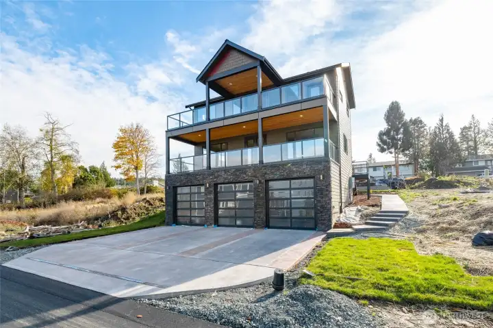 Driveway and front photo of home