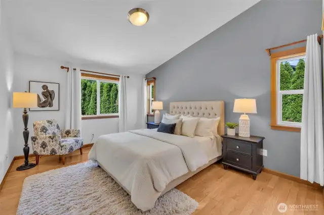 Primary bedroom is an oasis of space, light and calm