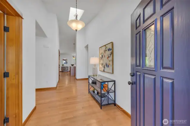 Spacious entry way and gorgeous hardwood floors greet you when you enter this home