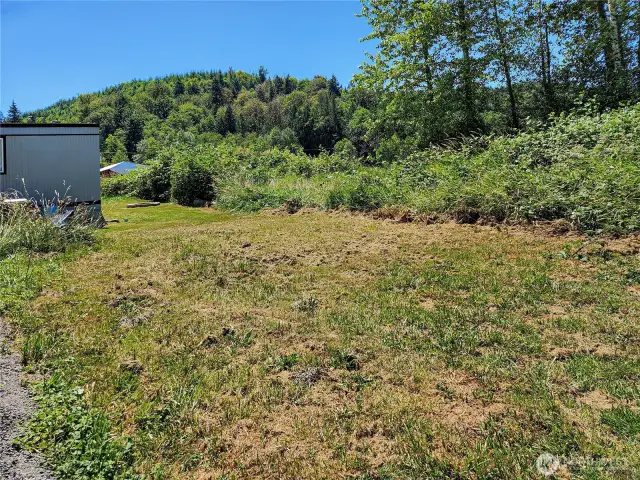 njoy peaceful views of the neighboring field from your backyard retreat.