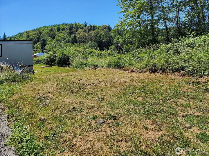 njoy peaceful views of the neighboring field from your backyard retreat.