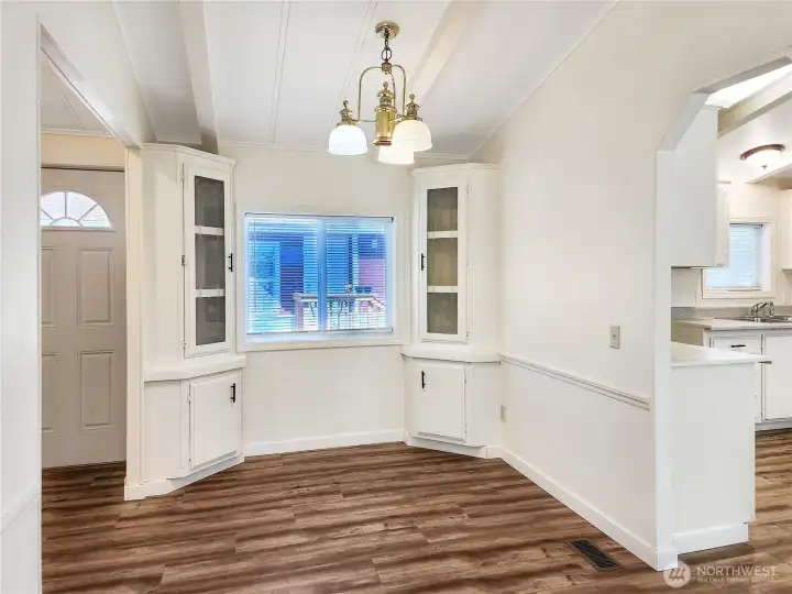 Cozy dining space just off the kitchen, perfect for evening meals or grabbing a quick snack.