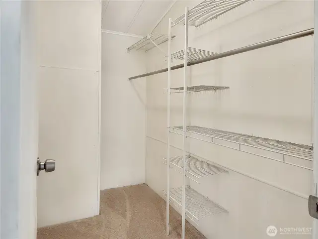 Storage Made Simple- Spacious walk-in closet helps keep your wardrobe neat and accessible.