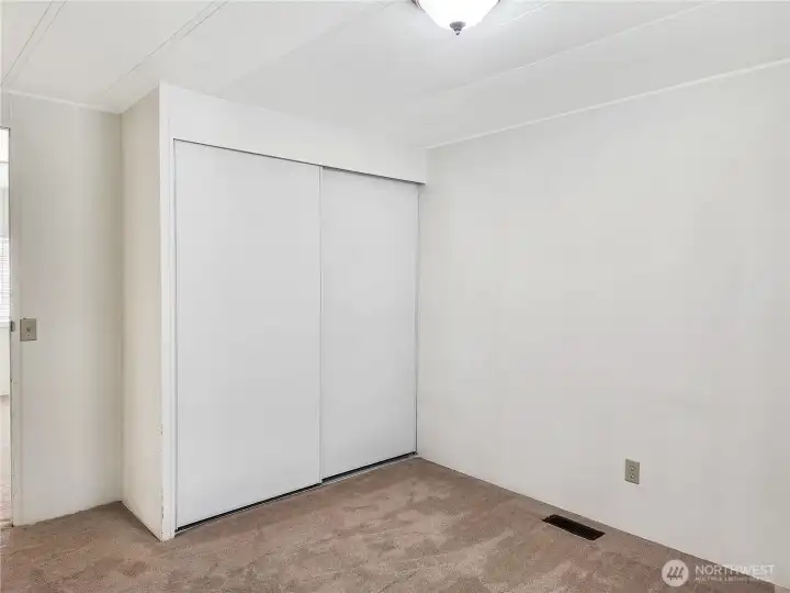 Third Bedroom Retreat- A comfortable and quiet space with fresh updates and potential.